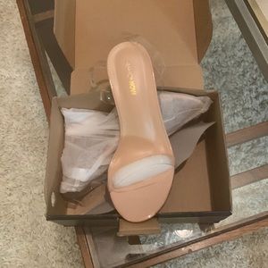 Stylish Clear and Nude, 8W, Heels with strap around the ankle, never been worn!